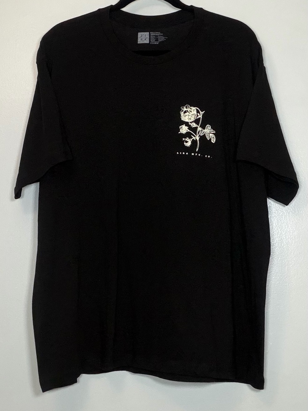 Lira Black Short Sleeve Tee with White Rose Graphic